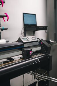 Close-up of modern printing machine in a professional studio environment.